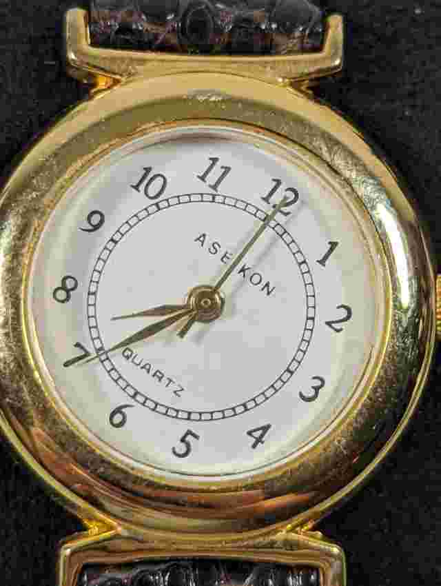 Aseikon WomansWhite Dial Round Gold Tone Case Brown Leather Band Watch 7 Inch