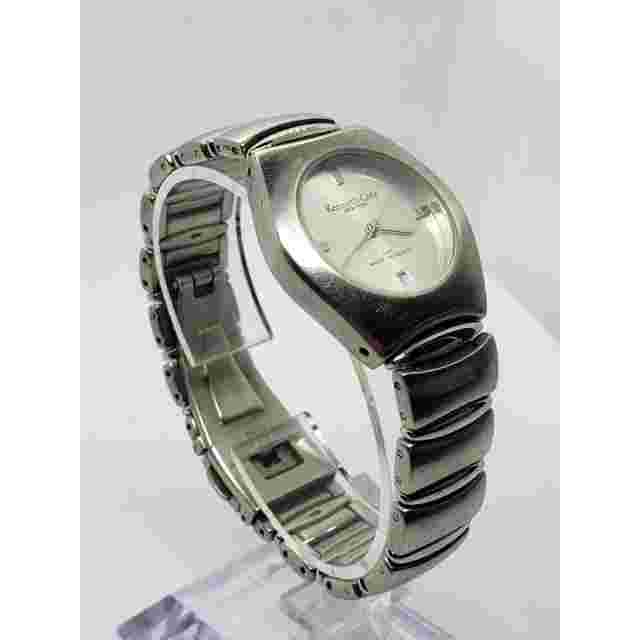 Kenneth Cole KC4145 women's watch. Calendar date on face. Silver on silver face