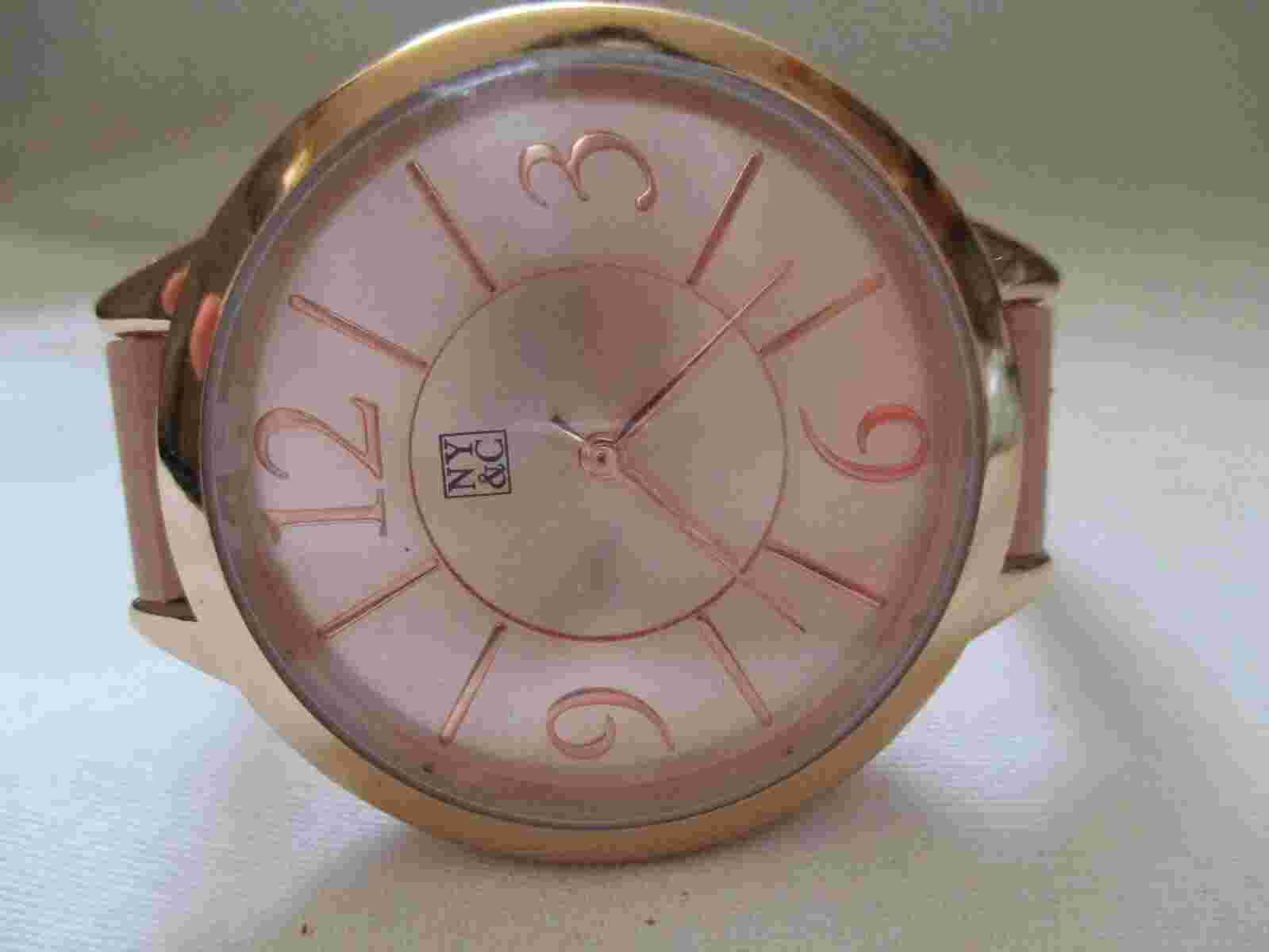 New York & Co Analog Wristwatch with a Buckle Band