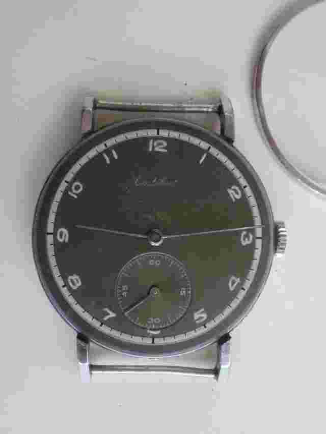 Cortebert big 37 mm. swiss cal.671 mechanical two tone dial vintage wrist watch