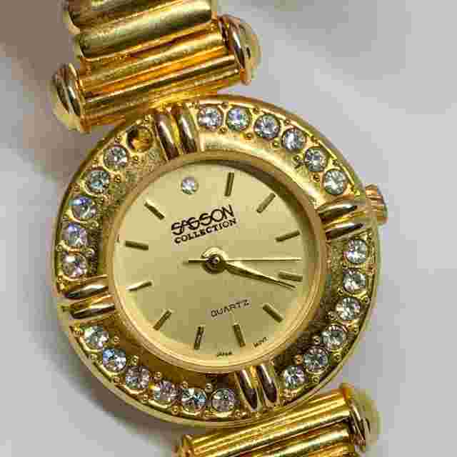 Sasson collection women’s watch two tone 26mm case reversible band 7” running