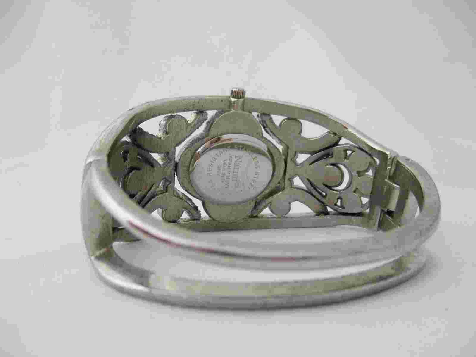 Narmi Women's Analog Watch Silver Toned Cuff Band Rhinestones