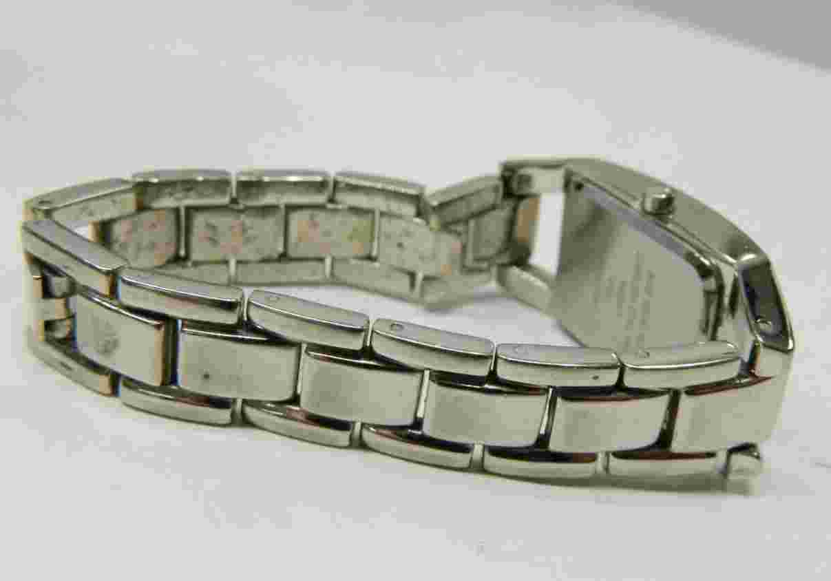 Beautiful NINE & CO. silver tone lady's watch/wristwatch