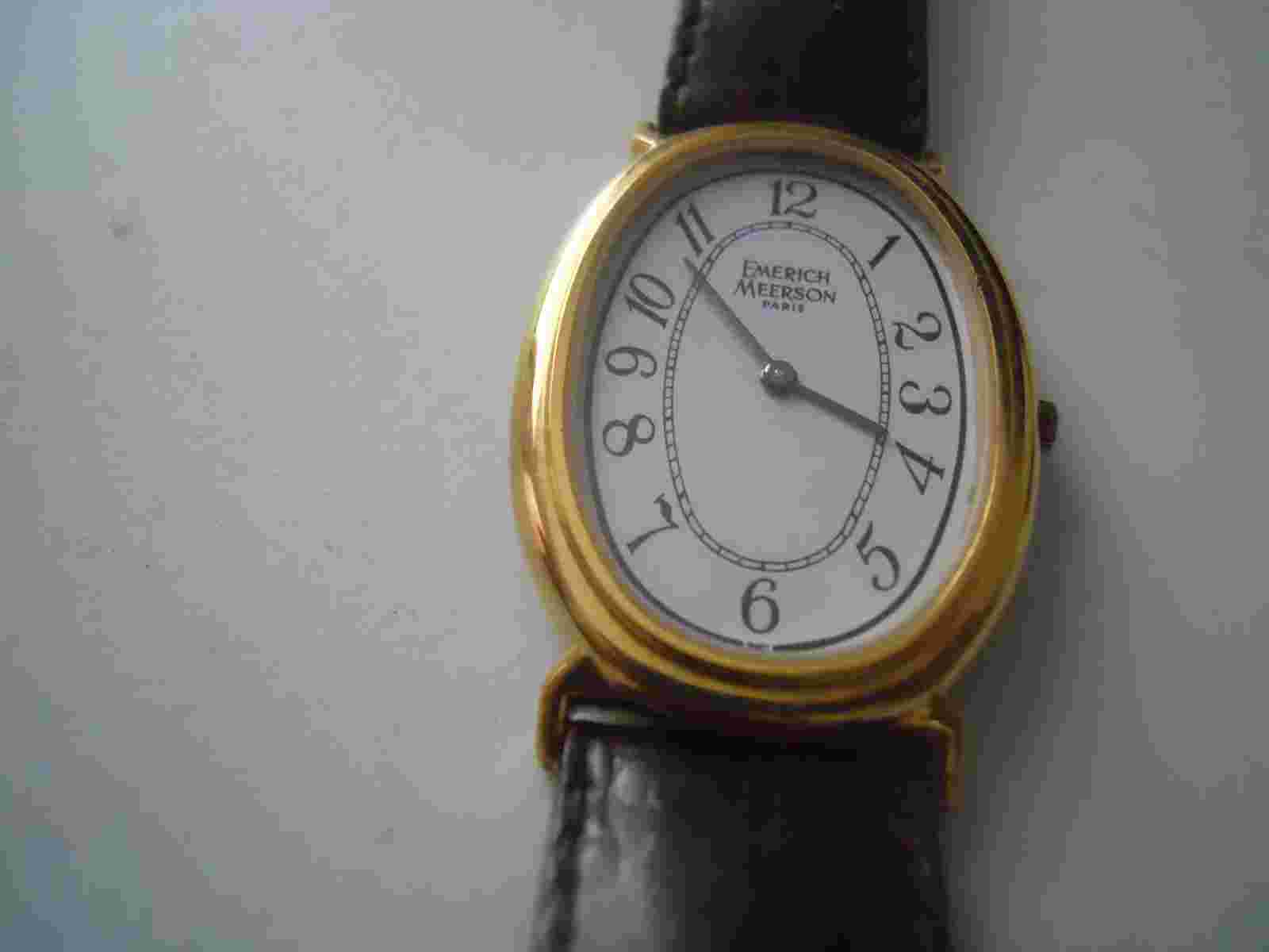 Vintage Emerich Meerson women's Brown leather band & Analog used wristwatch.