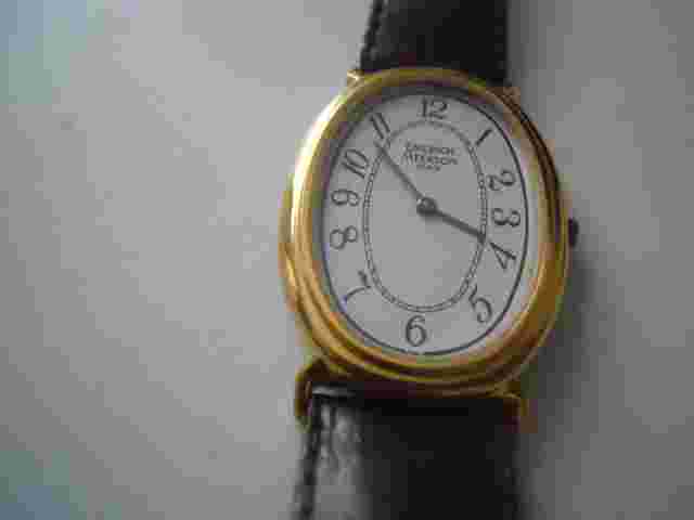 Vintage Emerich Meerson women's Brown leather band & Analog used wristwatch.