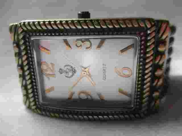 Premier Designs Analog Wriswatch with a Cuff Band and Quartz Movement