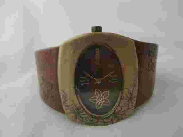 Decree Analog Wristwatch with a Buckle Band and Quartz Movement