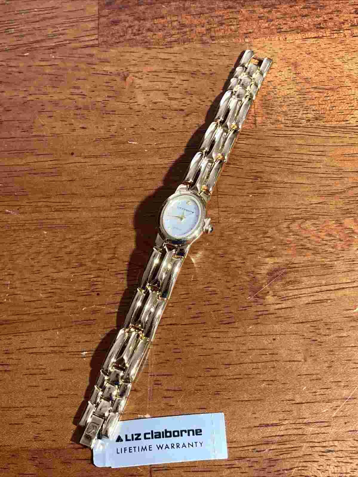 Liz Claiborne Watch Women 19mm Gold Tone Oval MOP Dial w Original Tags Works