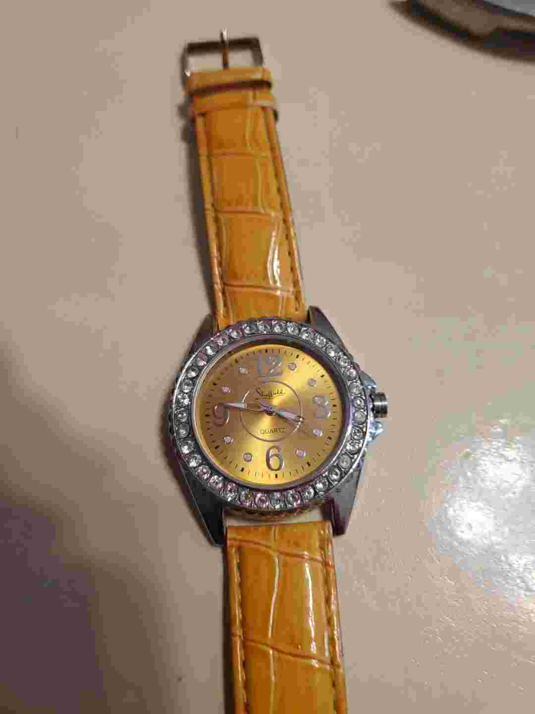 Sheffield Gold Dial Crystal Accent Round Silver Tone Case Orange Band Watch