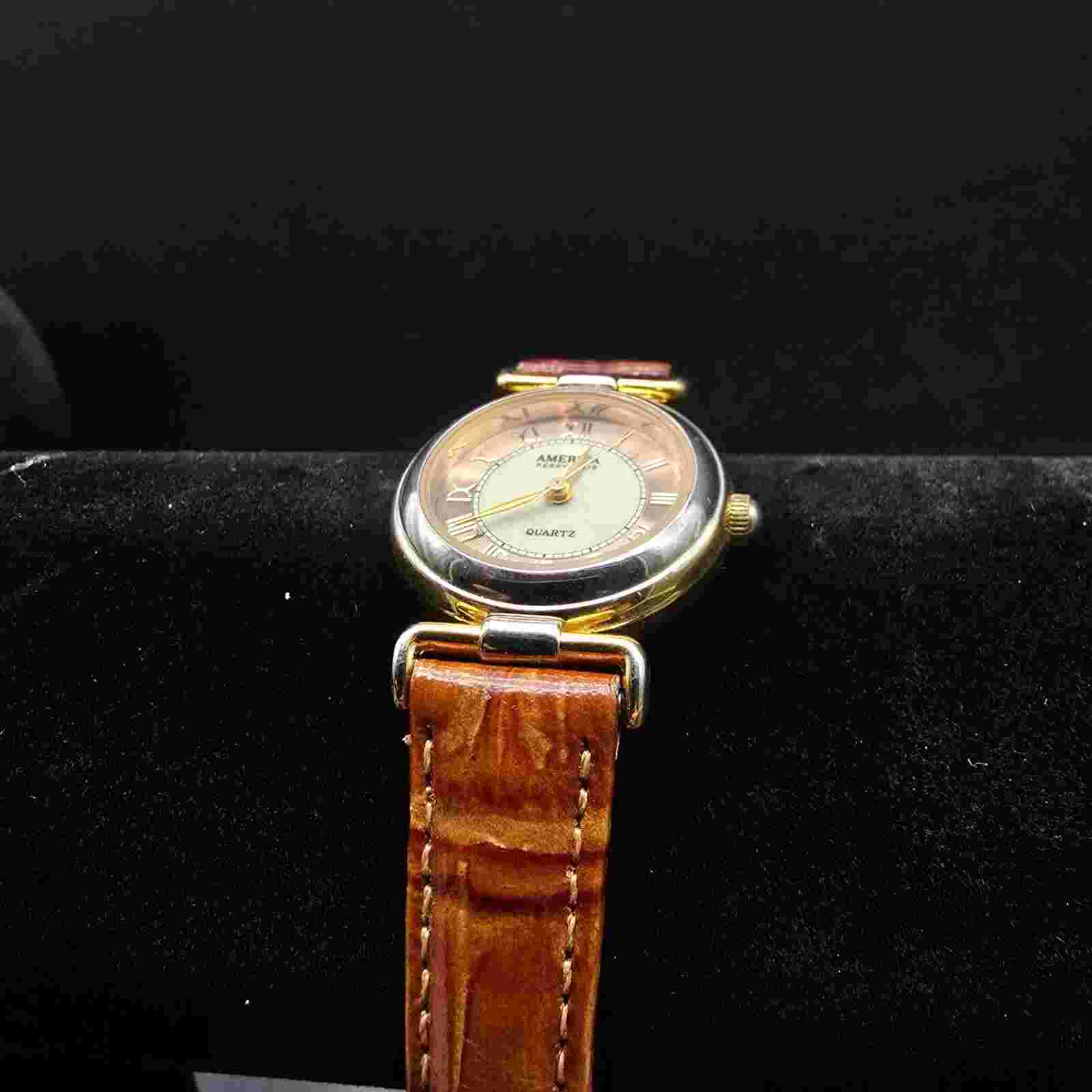 Women's America Perry Ellis Wrist Watch Brown Band White Silver Tone Face WORKS