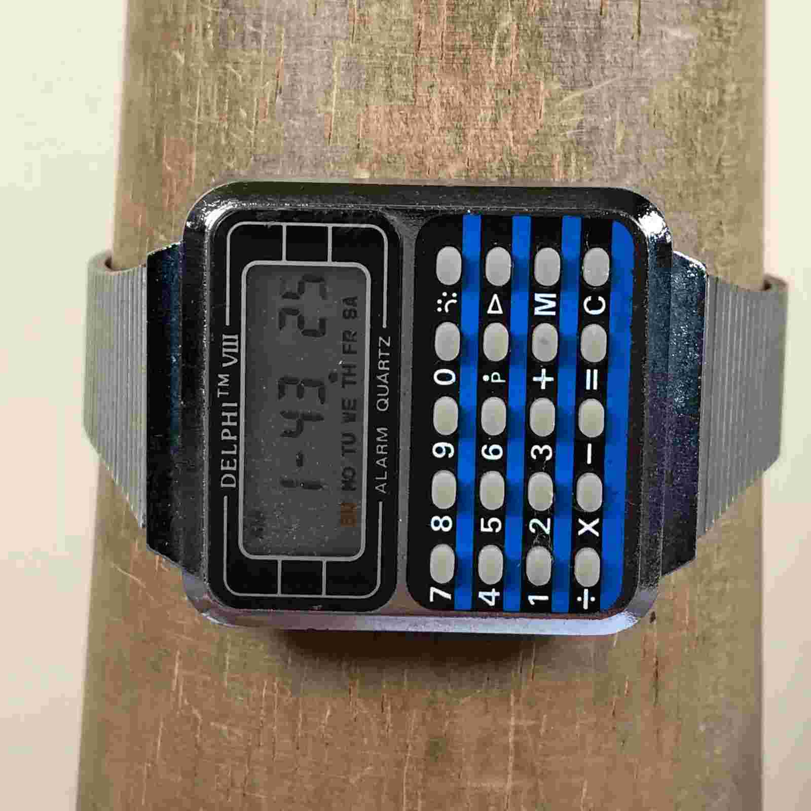 Vintage Delphi VIII Melody Men Calculator Alarm 42mm Quartz Digital Watch 8"