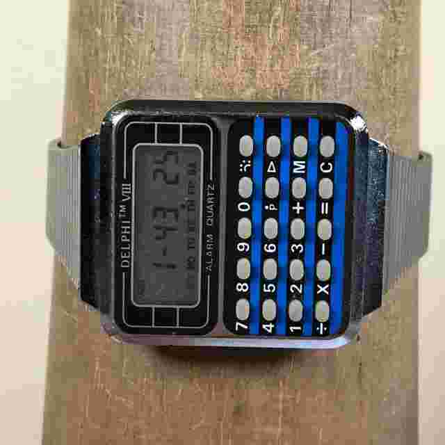 Vintage Delphi VIII Melody Men Calculator Alarm 42mm Quartz Digital Watch 8"