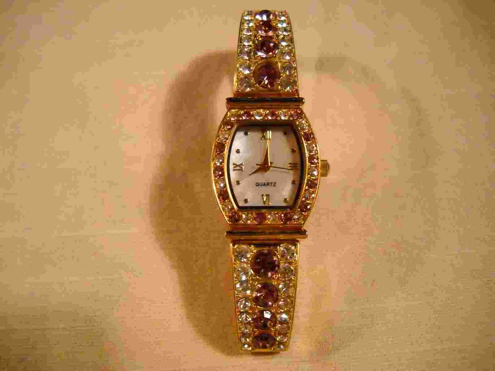 BEAUTIFUL GOLDTONE SIMULATED AMETHYST AND DIAMOND BIRTHSTONE WATCH