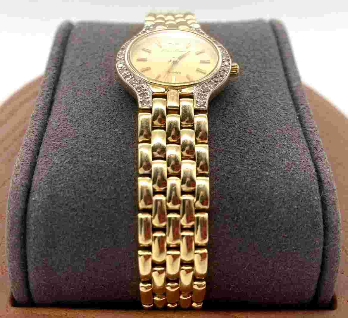 Lucien Piccard 14K Yellow Gold Ladies Round Face Watch w/ Diamond Bezel
