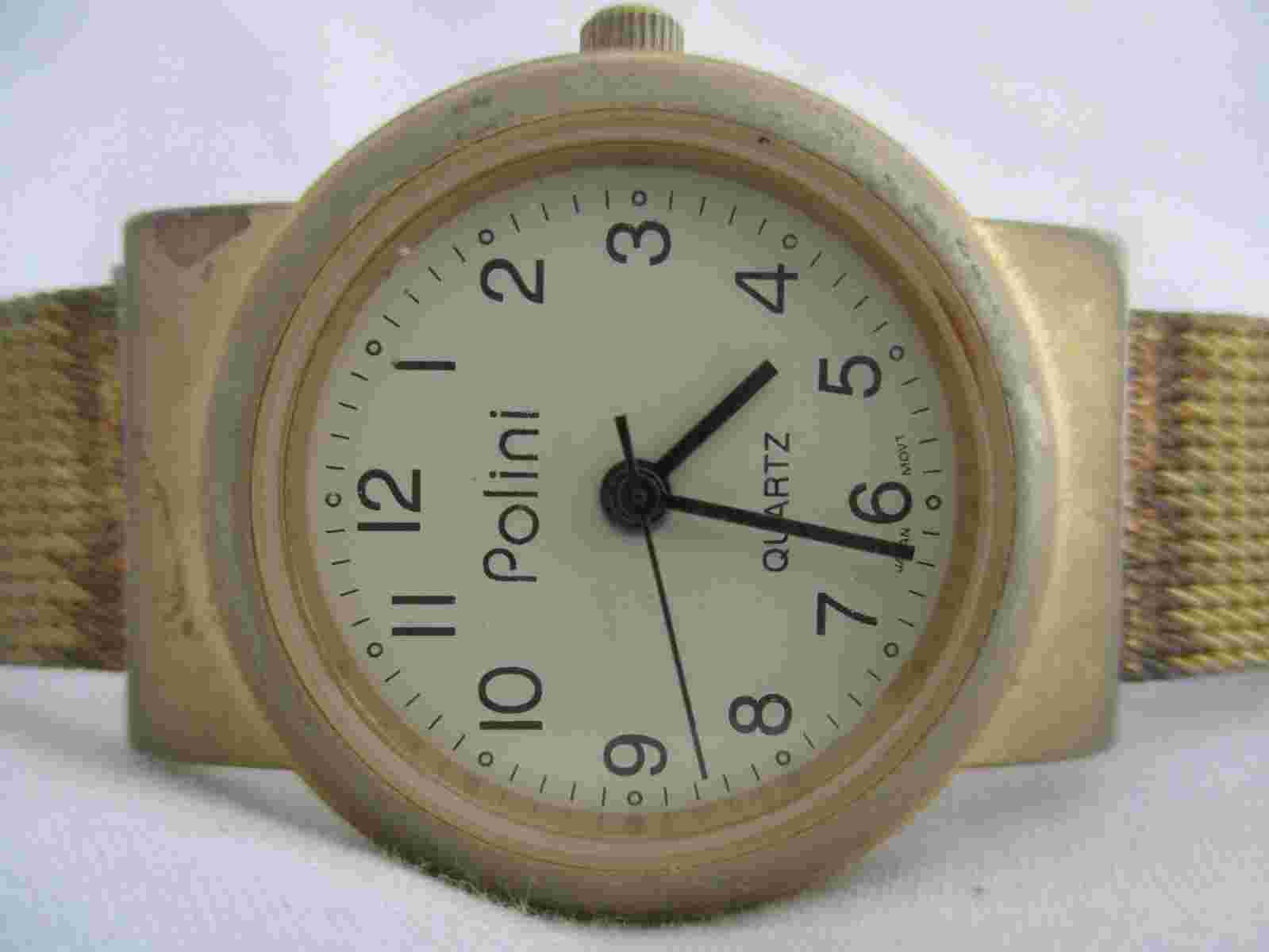 Polini Analog Wristwatch Gold Tone Buckle Band Round Face Elegant
