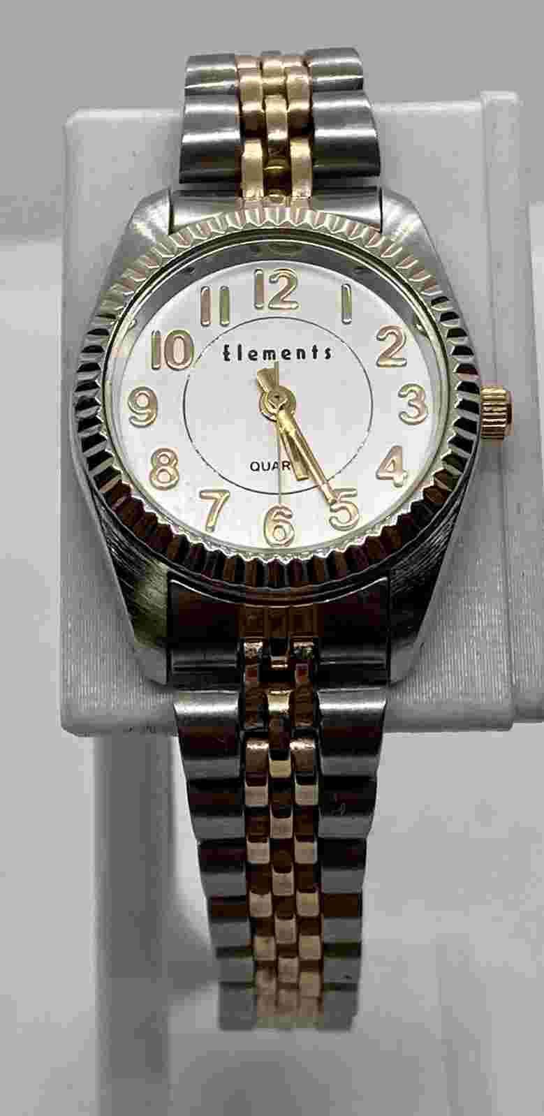 ELEMENTS Ladies Watch New Battery 7” Silver/ Gold Band Large Numbers