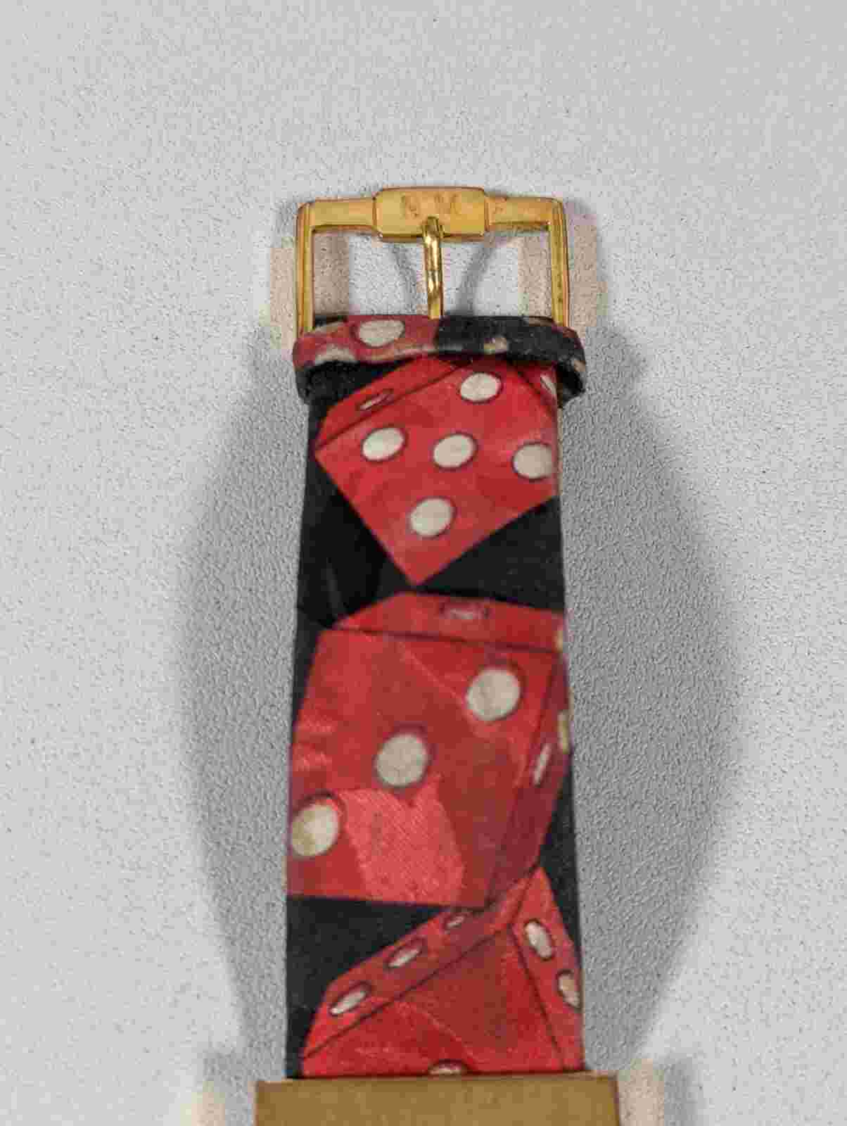 Nicole Miller Swiss White Dial Gold Tone Rectangle Case Black Red Band Watch