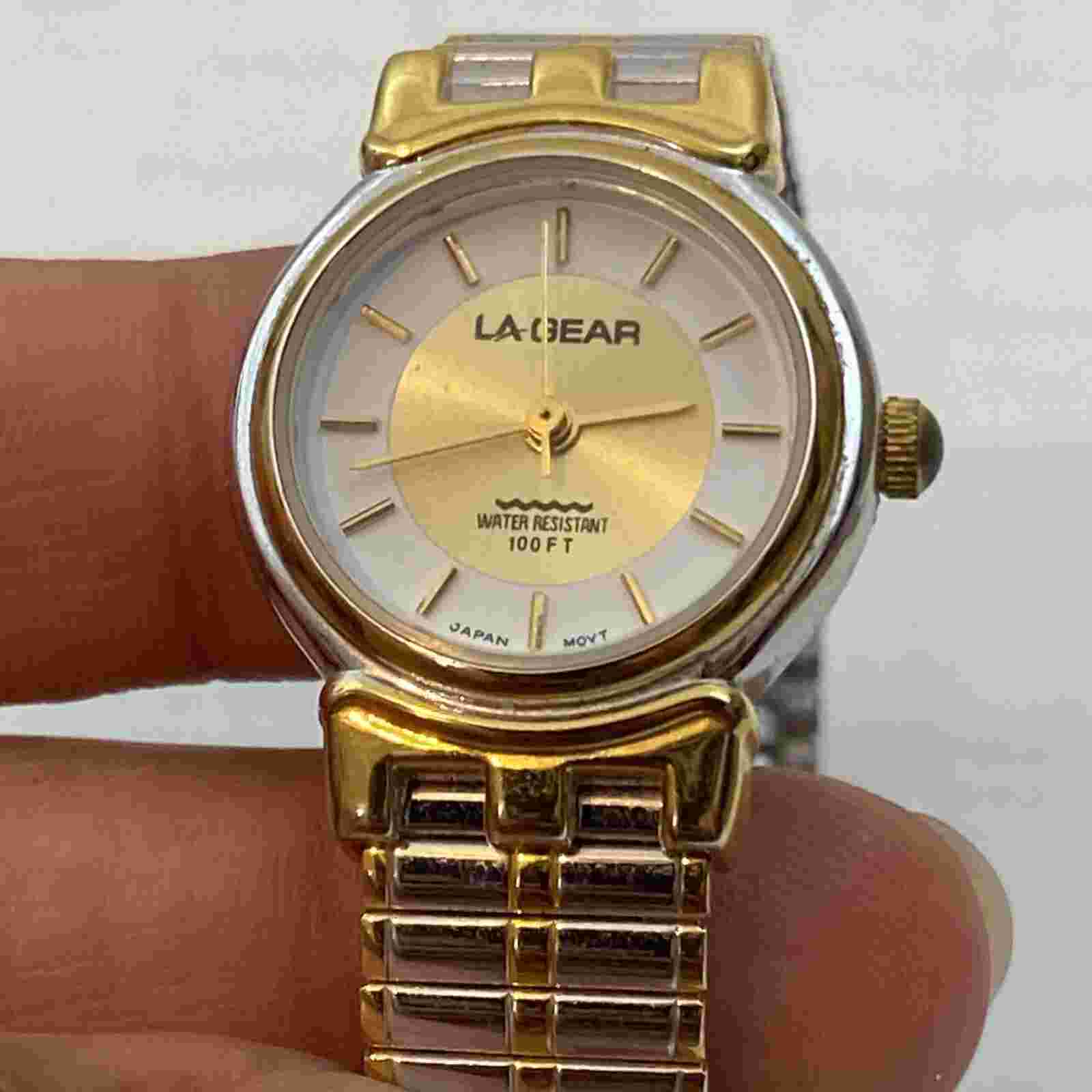 LA GEAR ladies gold tone stainless Steel Stretch band quartz Watch Vintage