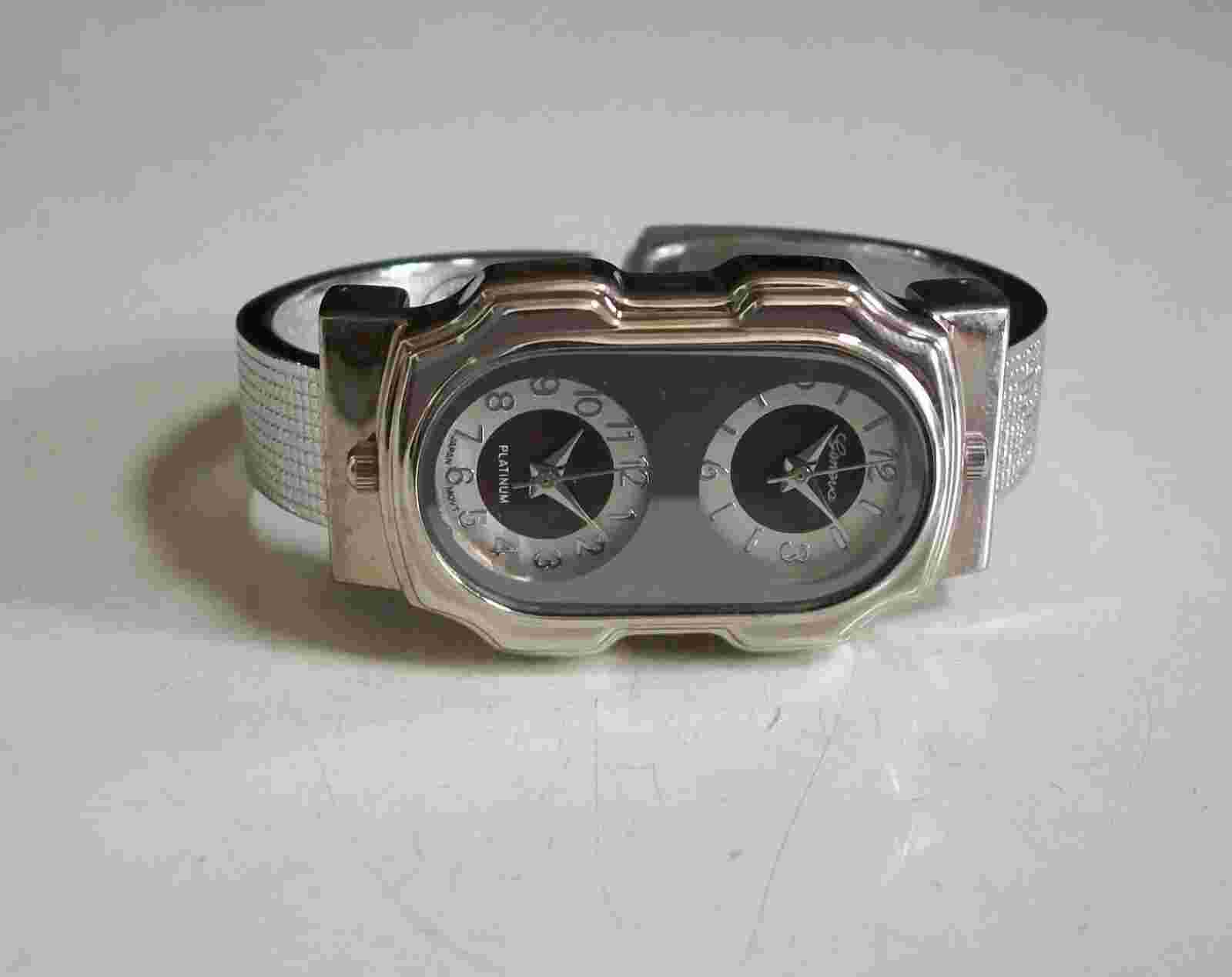 Women's silver finish dual time 2 time zone fashion bangle casual watch