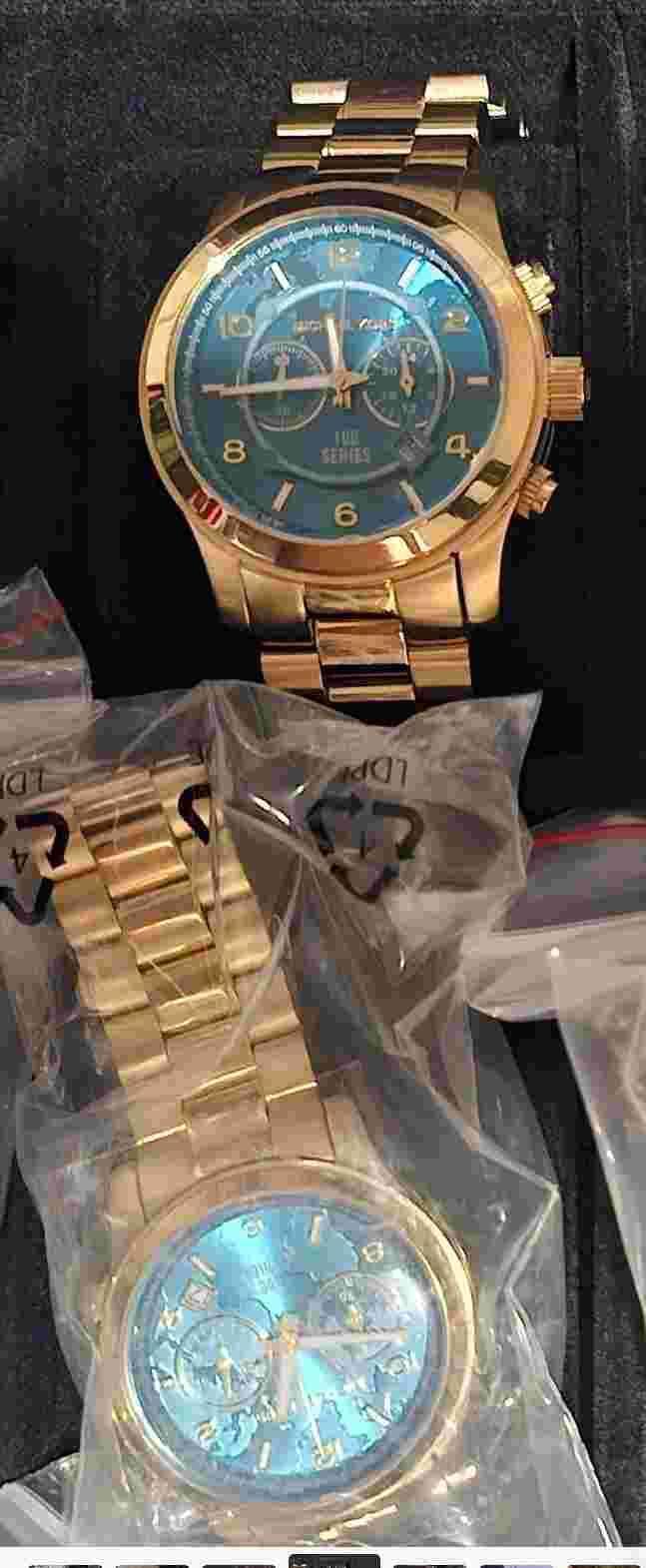 Couple's Michael Kors Stop Hunger Campaign Watches - His And Hers