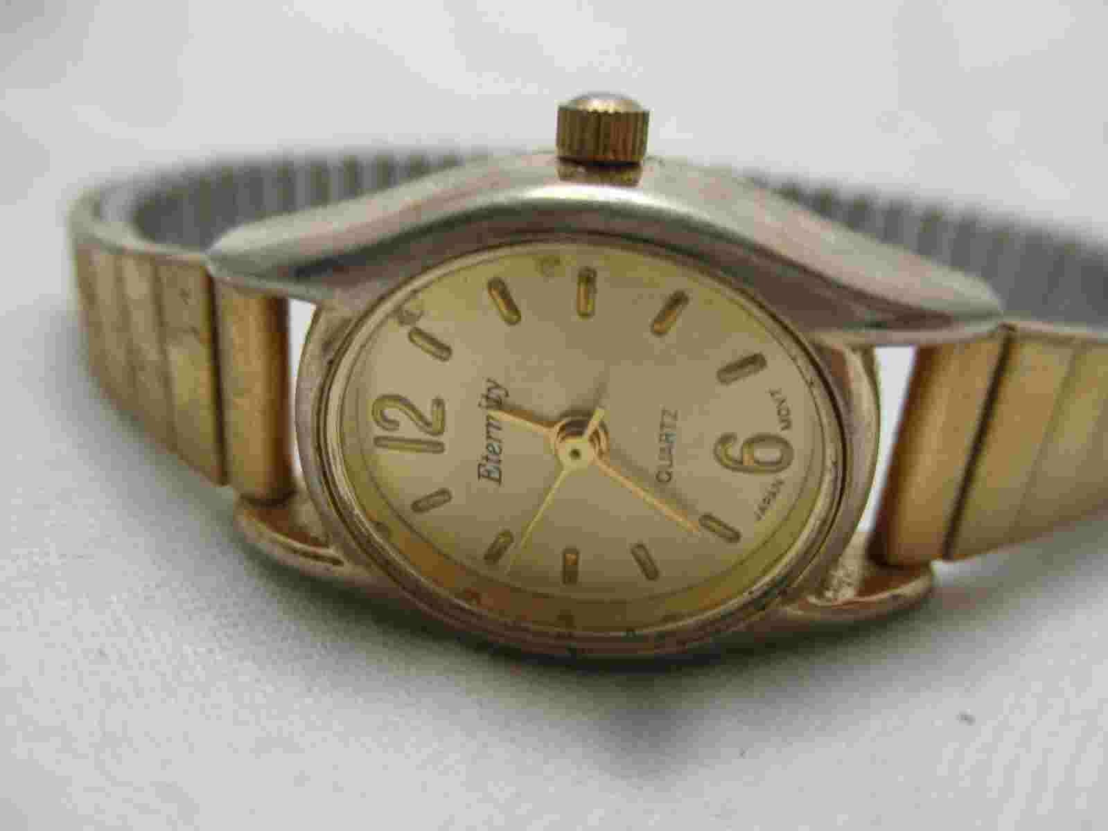 Eternity Wristwatch Oval Shaped Face Gold Tone Expansion Band Simple Style