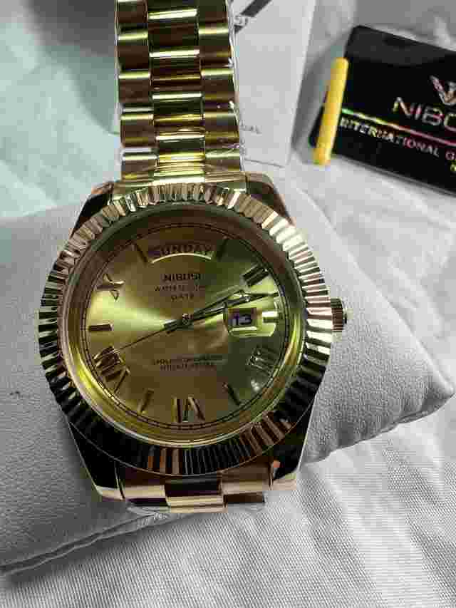 nibosi ,NI2628, classic,(Seiko design) WR30M, day and magnify on date,Fluted Bez
