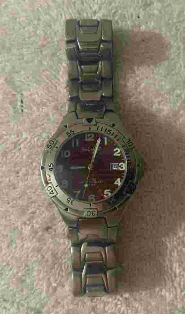 Bum Equipment Red Dial ~ Round ~ Date Indicator ~ Silver Tone Working Watch