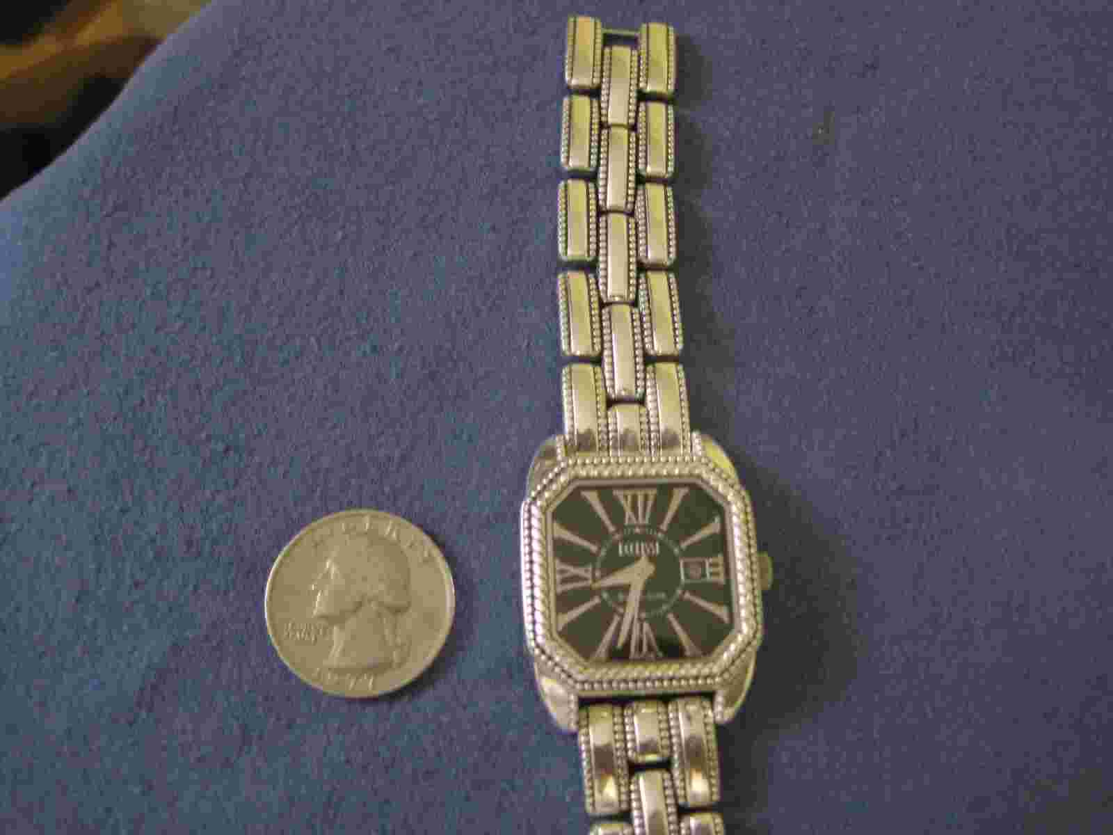 #704 ladys sterling silver ECCLISSI date watch bracelet