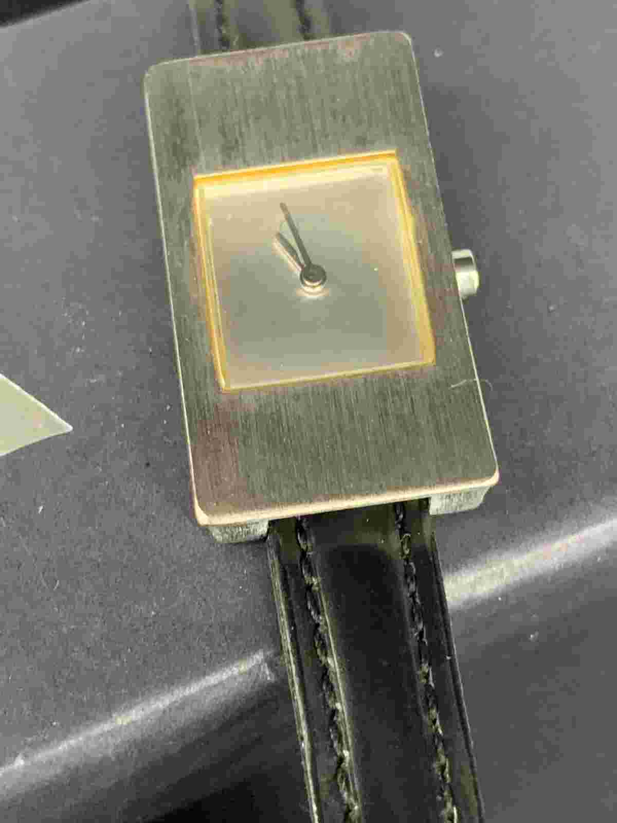 OPEX curve silver tone black buckle strap ladies watch