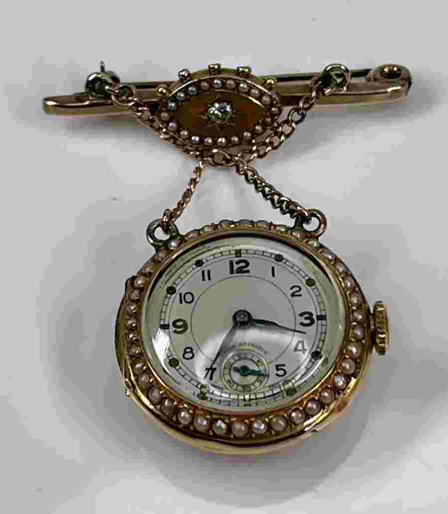 Pearl-encrusted ladies’ lapel watch 750 Gold Grand Prix Paris 1900