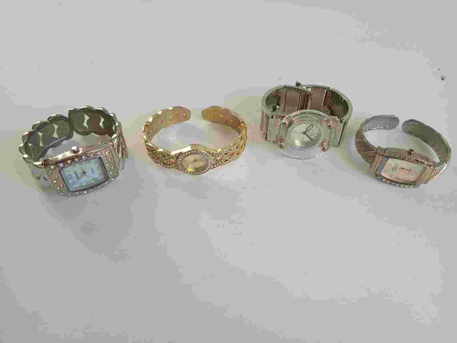 Lot of 4 Ladies Metal Cuff Bracelet Watches Working