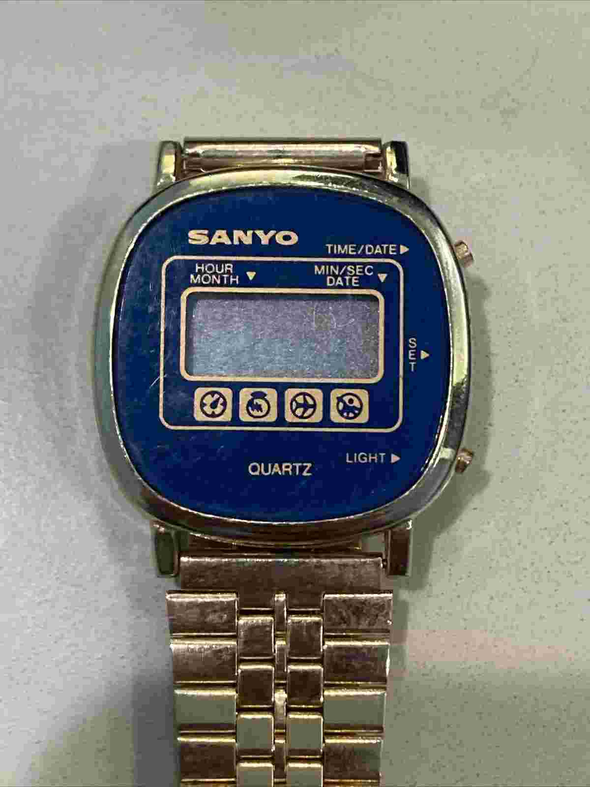 Vintage Sanyo LCD Quartz Digital Watch Gold Toned Light Up Alarm & Date Untested
