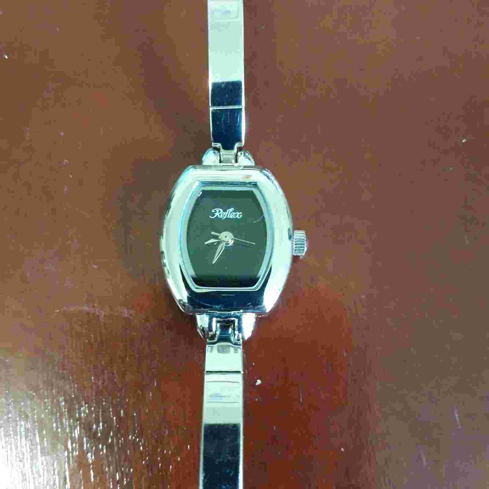Ladies Reflex Watch Oval Shaped Half Bangle Bright Chrome effect New original