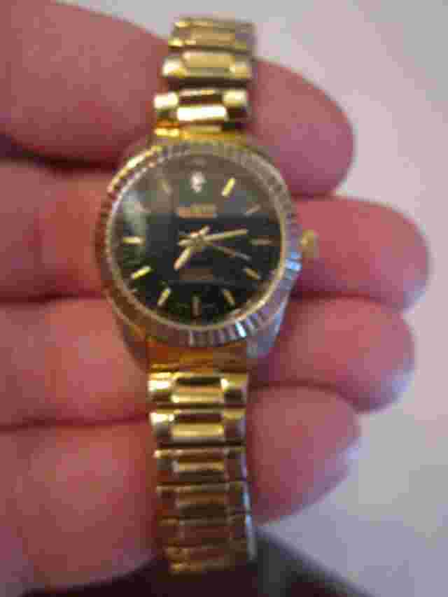 LADIES' QUINTEL DIAMOND WATCH - BLACK FACE - FLUTED BEZEL - QUARTZ - BBA-34