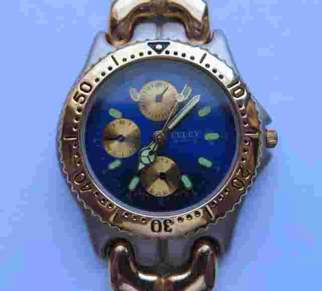 Pelex Blue Quartz Gents Watch, Original Gold Two Toned Strap,TMI Movt. SINGAPORE