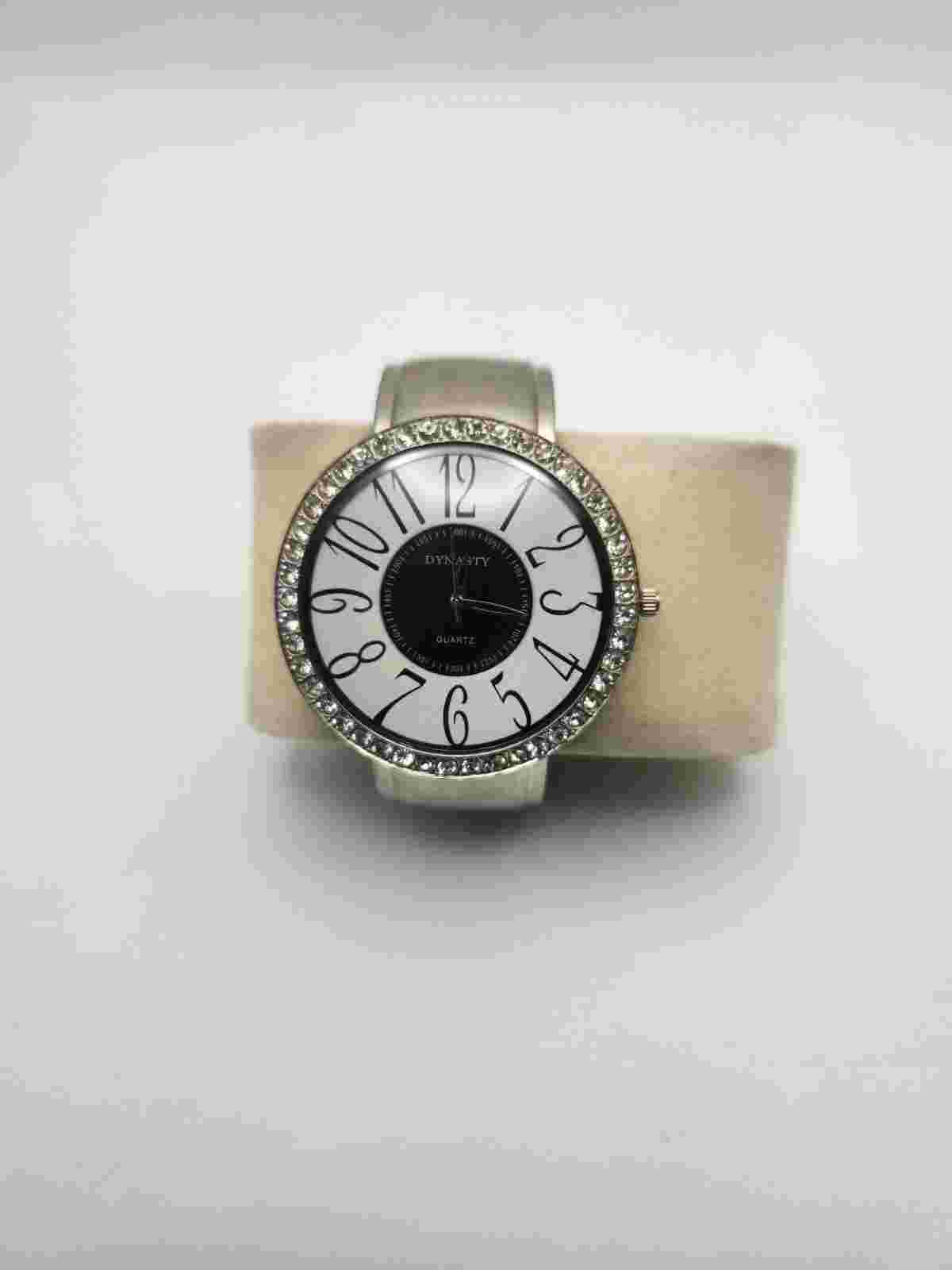 Dynasty Women's Quartz Watch.  Rhinestone Bezel Black and White Dial.  A14