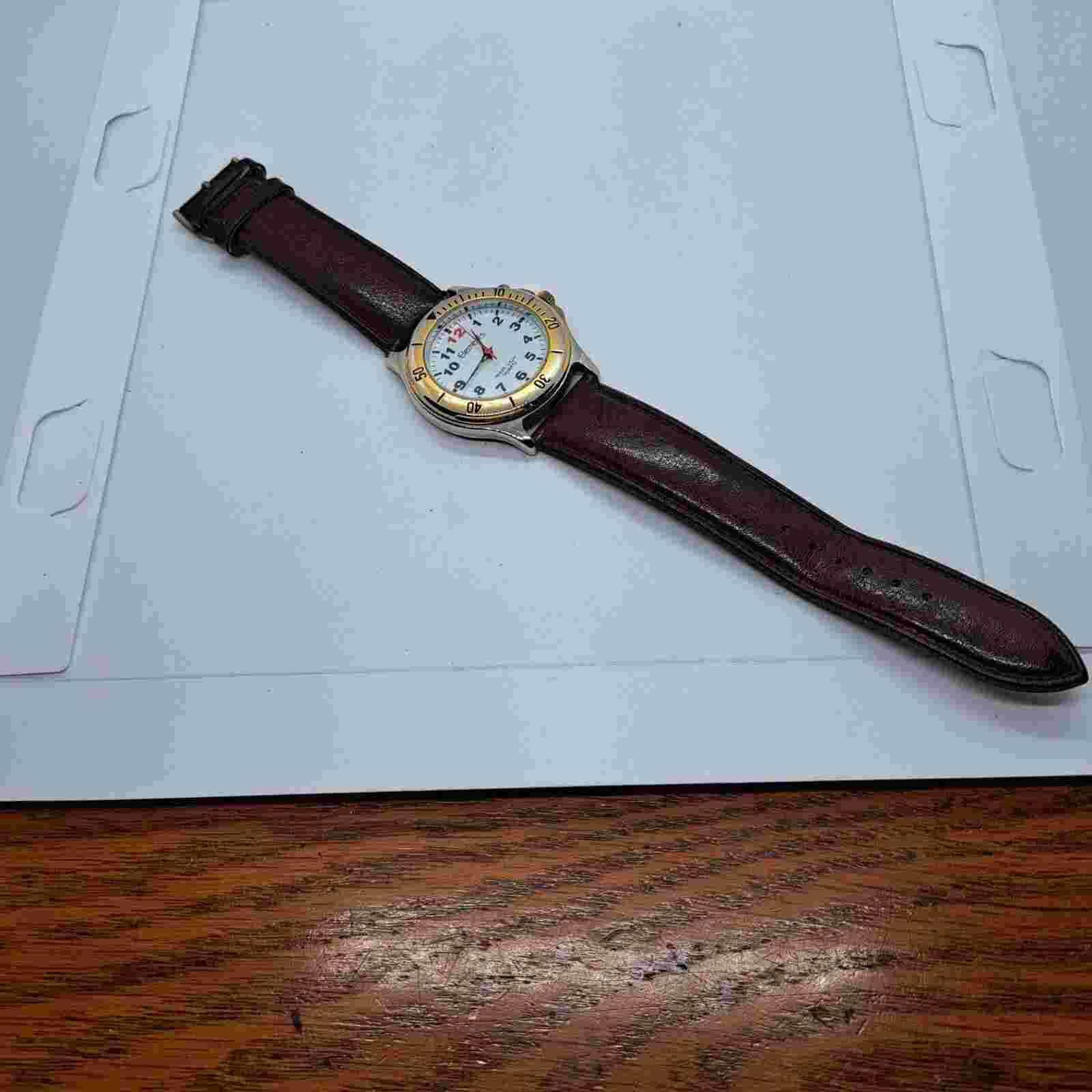 Elements Night Light Quartz Watch with gold tone bezel and chronograph brown