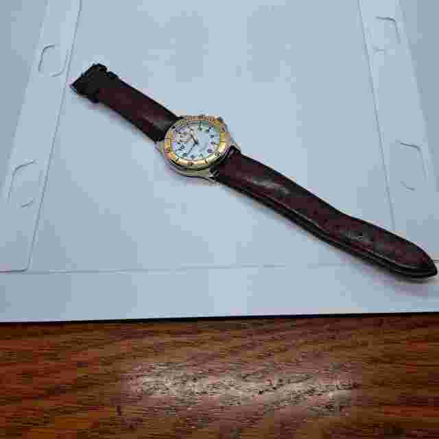 Elements Night Light Quartz Watch with gold tone bezel and chronograph brown