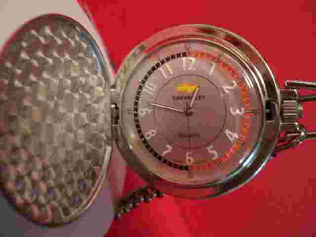 Pocket watch with Chevy w/ bow tie on face. new battery /w heavy duty chain