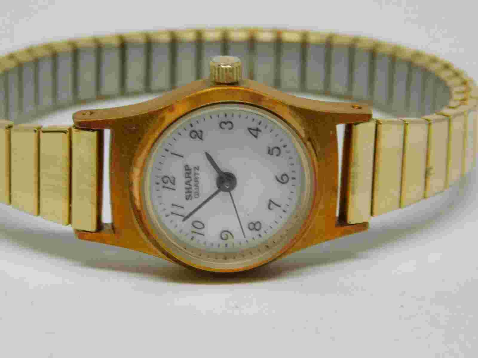 Sharp U.C. #379 Gold Tone Quartz Analog Women's Watch Sz. 5 1/2" New Battery