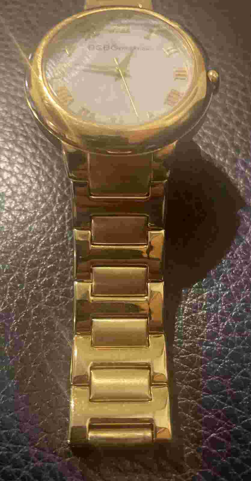 Women's BCBGeneration Gold Tone BCBG Watch some worn scraps on bracelet