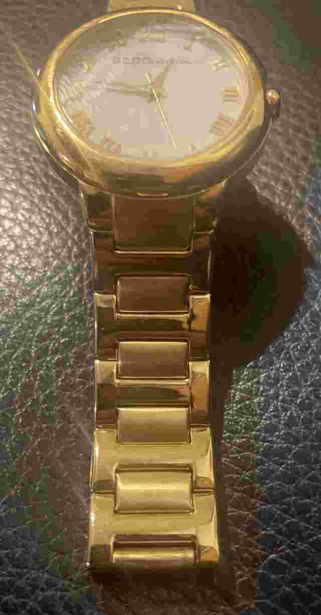 Women's BCBGeneration Gold Tone BCBG Watch some worn scraps on bracelet