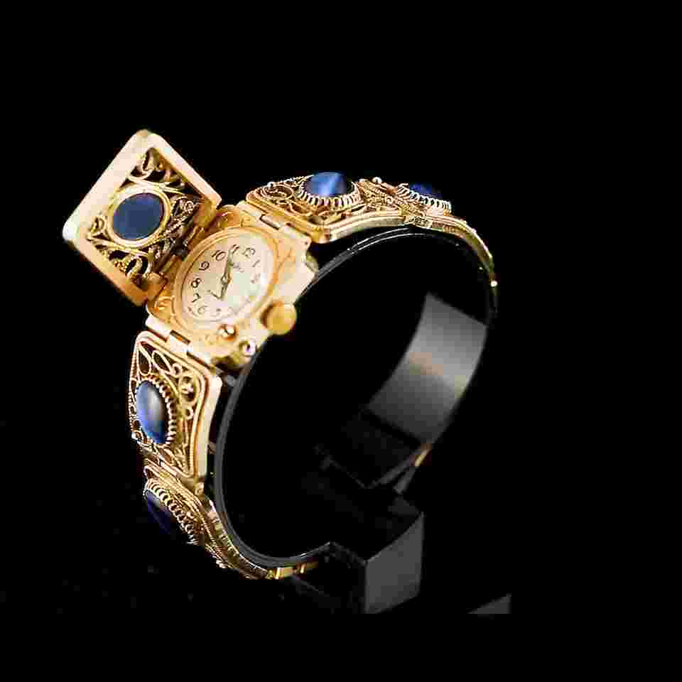 Vintage small cocktail gold-plated women's mechanical wristwatch. Chaika watch