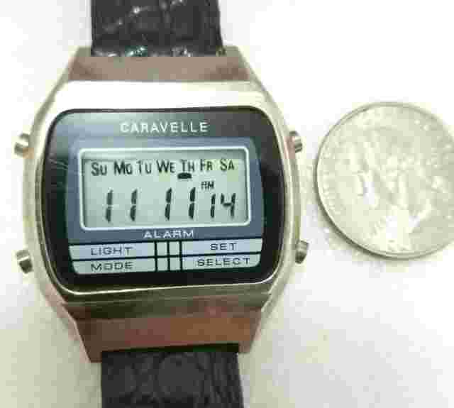 Bulova Caravelle LCD watch w/ Bulova leather band.