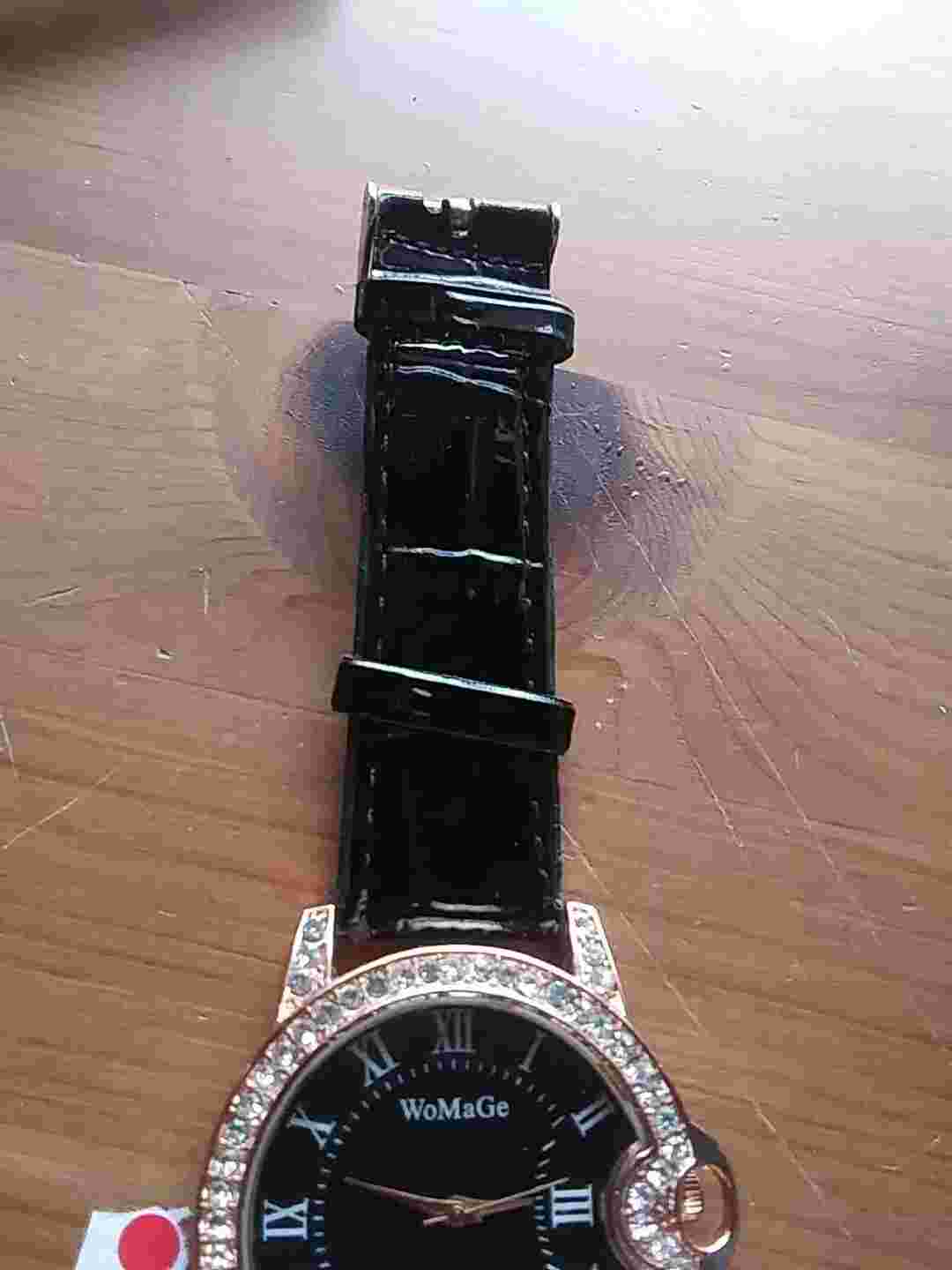 WoMaGe  ladies watch in good condition &  running with a new battery