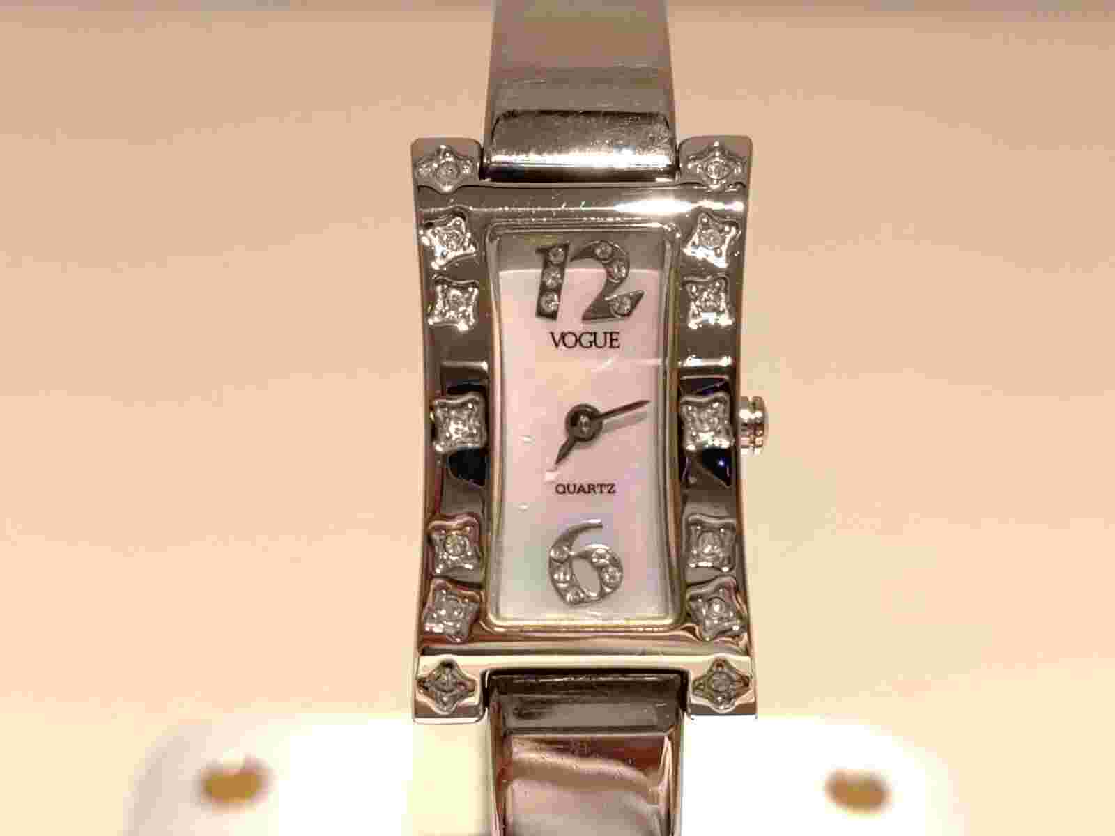 VINTAGE SWISS LADIES QUARTZ WATCH "VOGUE" WITH STONES AND MOTHER OF PEARL DIAL