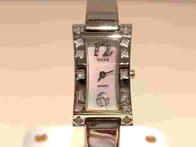 VINTAGE SWISS LADIES QUARTZ WATCH "VOGUE" WITH STONES AND MOTHER OF PEARL DIAL