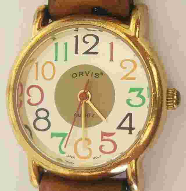 Orvis Gold Tone Ladies Watch w/Multicolored Band & Dial- New Battery