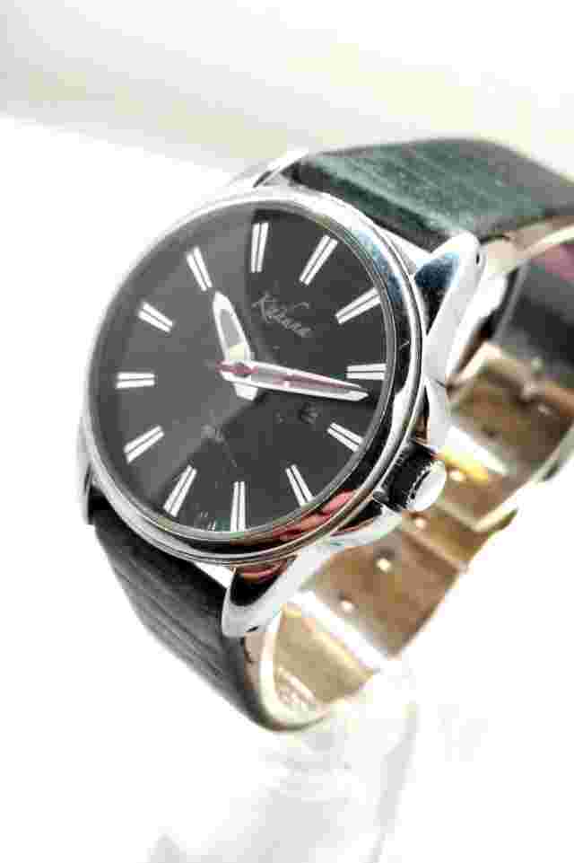 MENS KAHUNA STEEL CASED WATCH VGC AND RUNS WELL ON NEW BATTERY ATTRACTIVE WATCH