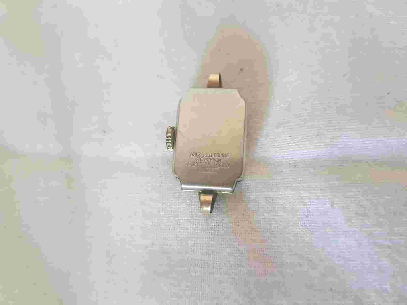 From one resolution: beautiful Luwa Eb Felsa roller gold double wristwatch